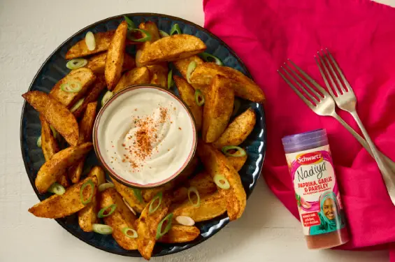 Potato Wedges with Seasoning, Spring Onions and Sour Cream