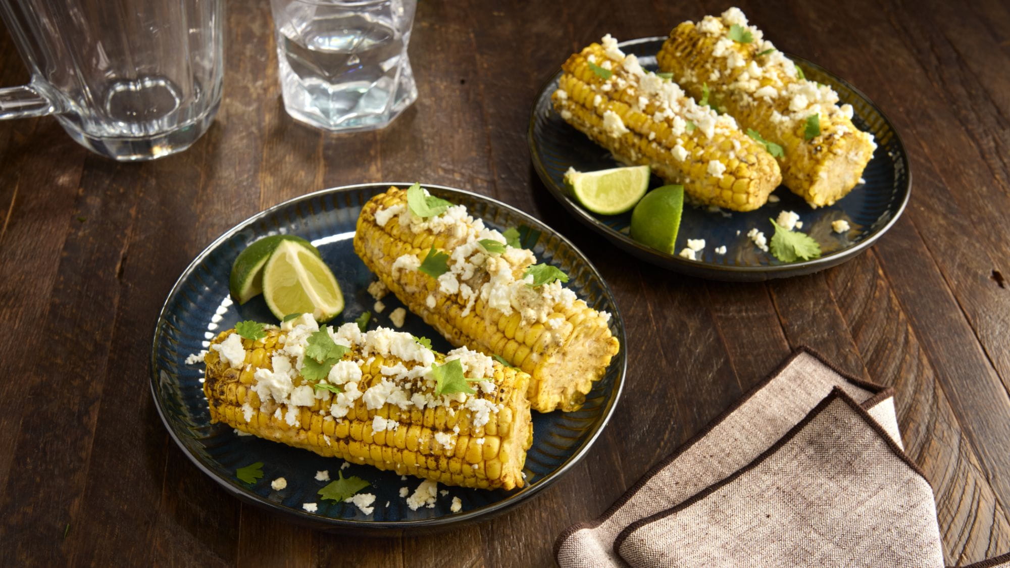 Zingy Old Bay Lemon and Herb buttered corn with crumbled feta