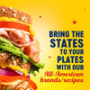 A towering deli sandwich featuring layers of turkey avocado and tomato is showcased in this Global Visionary Template Uk advertisement for All-American brands and recipes.