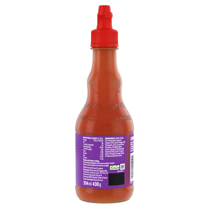 The back of a bottle of Frank'S Redhot Franks Squeeze Tangy Bbq 354 Ml displays the nutritional values and ingredients list for consumer information.