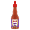 A bottle of Frank'S Redhot Franks Squeeze Tangy Bbq 354 Ml featuring a purple label and a red squeeze cap against a black background.