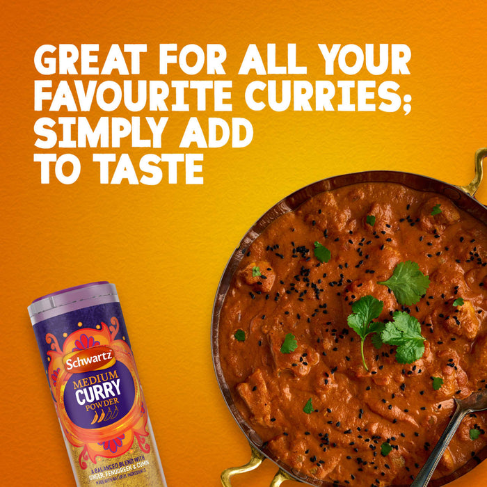 A jar of Schwartz Medium Curry Powder 90G is displayed next to a large pan of rich chicken curry garnished with fresh cilantro and black sesame seeds against a textured orange background.