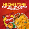 A packet of Schwartz Shepherd'S Pie Recipe Mix 38G is featured in an advertisement next to a finished shepherd's pie made with a sweet potato mash topping and melted cheese.