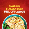A close-up of a finished bowl of spaghetti carbonara, made using the Schwartz Spaghetti Carbonara Recipe Mix 32G, is shown against a red background with the text Classic Italian Dish Full of Flavour.