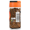 A clear glass jar of Schwartz Star Anise Whole 10G shows the star-shaped spice pods through the label which includes a barcode and recycling information.