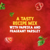 A promotional image for Schwartz Beef Casserole Recipe Mix 38G features the text A TASTY RECIPE MIX WITH PAPRIKA AND FRAGRANT PARSLEY on a red background, surrounded by floating parsley leaves and slices of red pepper.