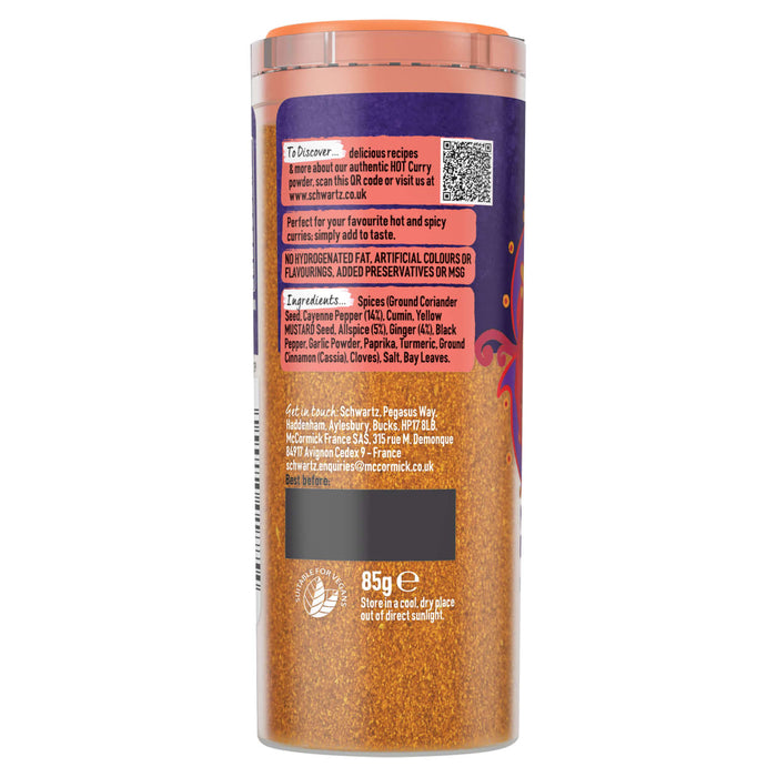 A side view of the label for Schwartz Hot Curry Powder 85G showing the ingredients list and storage instructions on a clear jar filled with vibrant orange spice.