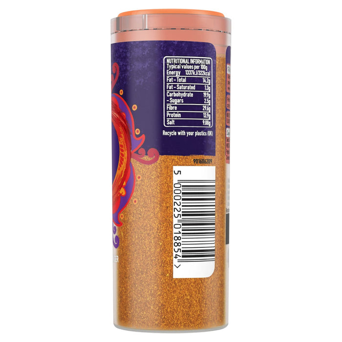 A side view of a jar of Schwartz Hot Curry Powder 85G showing the nutritional information and barcode on a purple and orange label.