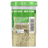 A large clear jar of Schwartz Garlic Granules 145G features a green lid and a label with storage instructions and recycling information.