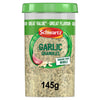 A 145g container of Schwartz Garlic Granules 145G featuring a green lid and a label showing a whole garlic clove and sliced pieces.