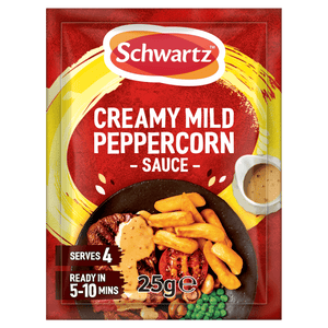 A packet of Schwartz Creamy Mild Peppercorn Sauce Mix 25G featuring a serving suggestion of steak with chips and peas.