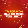 A graphic illustration with a red textured background and scattered lentils provides a cooking tip for Sa Cottage Pie, suggesting to try replacing half the mince with lentils.