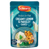 A 300g pouch of Schwartz Fish Lemon & Parsley Sauce 300G featuring a serving suggestion of white fish with roasted potatoes and greens.