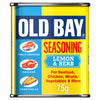 A 75g tin of Old Bay Lemon & Herb Seasoning featuring a yellow and blue label with illustrations of fish, chicken, and corn.