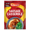 A red packet of Schwartz Sausage Casserole Recipe Mix 35G is displayed in front of a blue plate with a serving suggestion of sausage casserole over mashed potatoes with a side of greens.