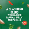 The key ingredients for Schwartz Bella Italia Gamberoni Garlic & Chilli Prawn Spaghetti 35G, including chili, garlic, and parsley, are shown floating against a green background.