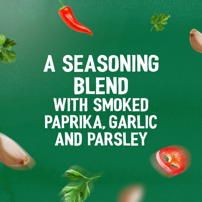 The key ingredients for Schwartz Bella Italia Gamberoni Garlic & Chilli Prawn Spaghetti 35G, including chili, garlic, and parsley, are shown floating against a green background.