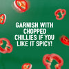 A serving suggestion for Schwartz Bella Italia Gamberoni Garlic & Chilli Prawn Spaghetti 35G shows sliced red chillies on a green background with the text, Garnish with chopped chillies if you like it spicy!