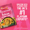 A promotional image displays a packet of Schwartz Las Iguanas Bahian Coconut Curry 25G against a bright pink background, accompanied by text highlighting Schwartz as the UK's number one flavour expert.
