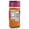 A back view of a glass jar of Schwartz Extra Spicy Cajun 42G Grill&Sizzl seasoning showing the nutritional information and recycling symbols on the label.