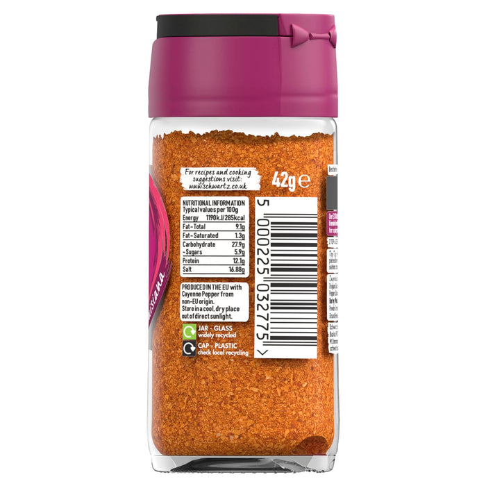 A back view of a glass jar of Schwartz Extra Spicy Cajun 42G Grill&Sizzl seasoning showing the nutritional information and recycling symbols on the label.