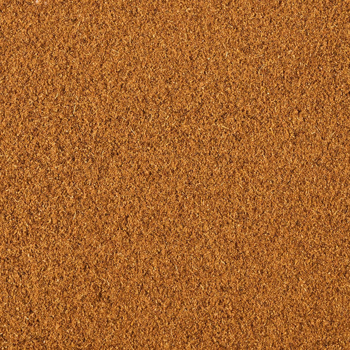 A detailed close up view shows the fine texture and warm brown tones of Schwartz Chinese 5 Spice Seasoning 58G spread evenly across the frame.