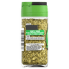 The back of a clear glass jar of Schwartz Oregano 7G, showing the dried herb and label with cooking suggestions and company information.