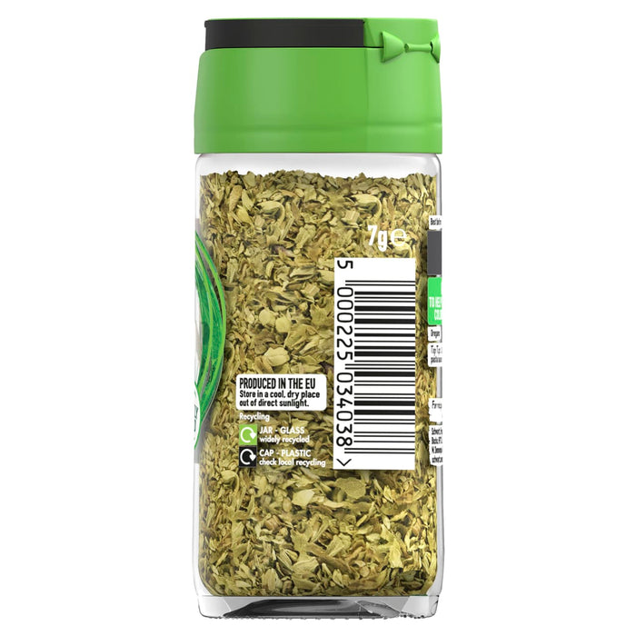 The back of a glass jar of Schwartz Oregano 7G, showing the dried oregano leaves, barcode, and recycling information on the label.