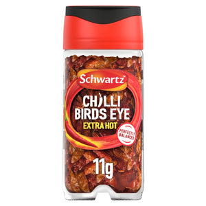 A clear glass jar of Schwartz Birds Eye Chillies 11G filled with whole dried extra hot red peppers and topped with a red and black cap.