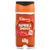 A clear glass jar of Schwartz Smoked Paprika 40G is shown against a white background, featuring an orange and black lid.
