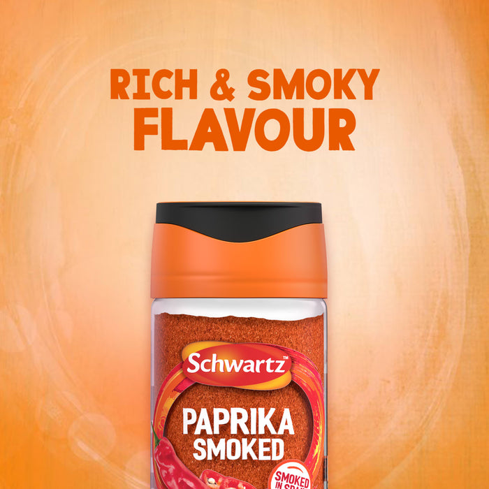A jar of Schwartz Smoked Paprika 40G is centered against a warm, orange background with the words Rich & Smoky Flavour written above.