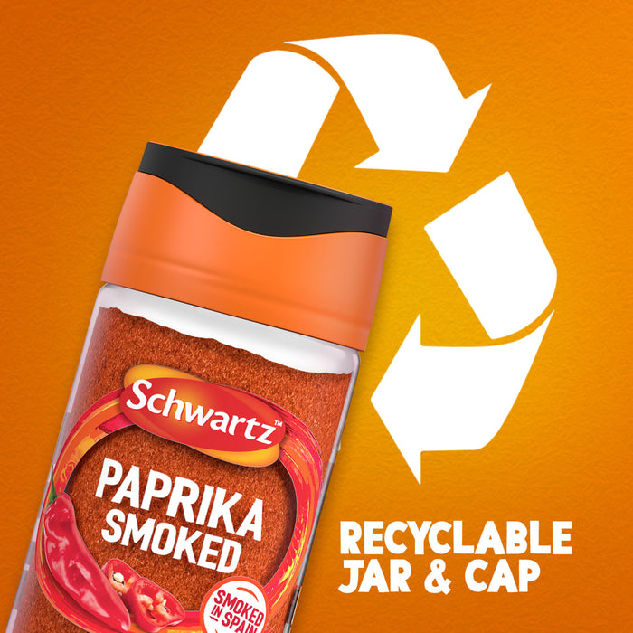 A jar of Schwartz Smoked Paprika 40G is set against an orange background with a large recycling symbol to highlight that the jar and cap are recyclable.
