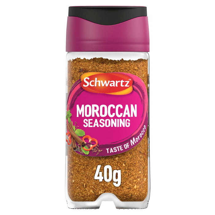 A clear glass jar of Schwartz Moroccan Seasoning 40G featuring a vibrant pink label with illustrations of cinnamon sticks and red peppers.