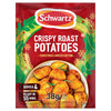 A packet of Schwartz Christmas Limited Edition Crispy Roast Potatoes 38G featuring a festive red and green design with a bowl of golden seasoned potatoes.