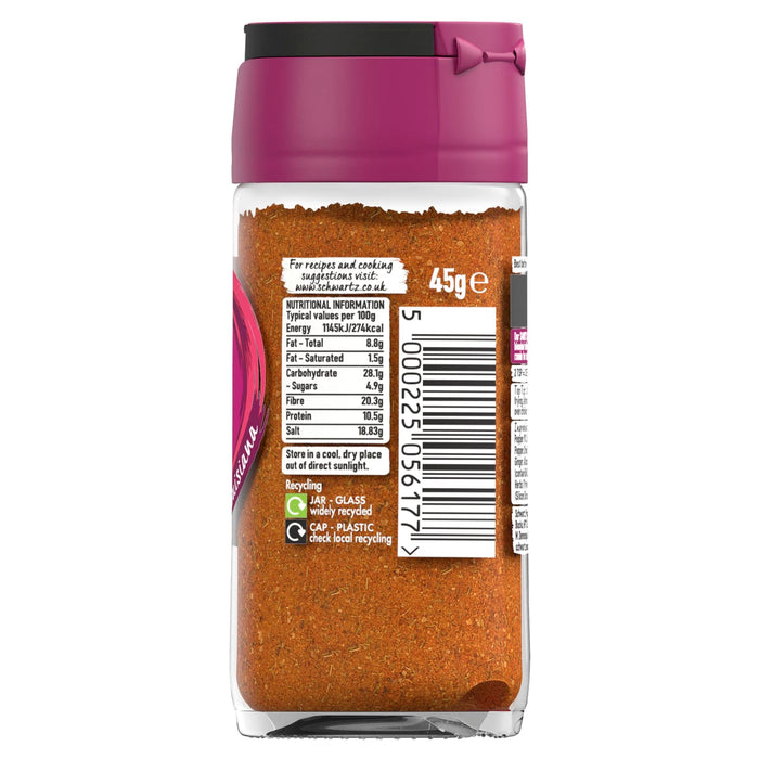 The back label of a glass jar of Schwartz Smoky Cajun Seasoning 45G displays nutritional information and recycling instructions against the backdrop of the orange spice blend.
