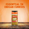 A jar of Schwartz Cumin Ground 37G is shown on a wooden table, with text in the background reading Essential in Indian Curries.