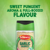 A clear jar of Schwartz Garlic Granules 50G is shown against a vibrant green background with text above reading Sweet pungent aroma & full-bodied flavour.