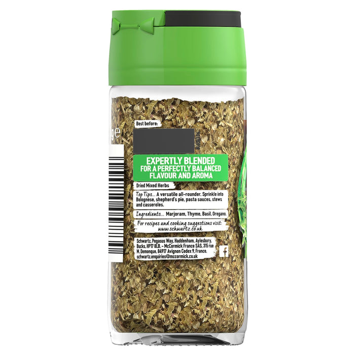 The back of a clear glass jar of Schwartz Mixed Herbs 11G, showing the label with ingredients like marjoram, thyme, basil, and oregano.