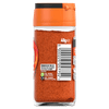 The back of a glass jar of Schwartz Paprika 40G displays the barcode, recycling symbols, and storage instructions against a black background.