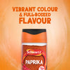 An advertisement shows a jar of Schwartz Paprika 40G against an orange background, with text highlighting its vibrant colour and full-bodied flavour.