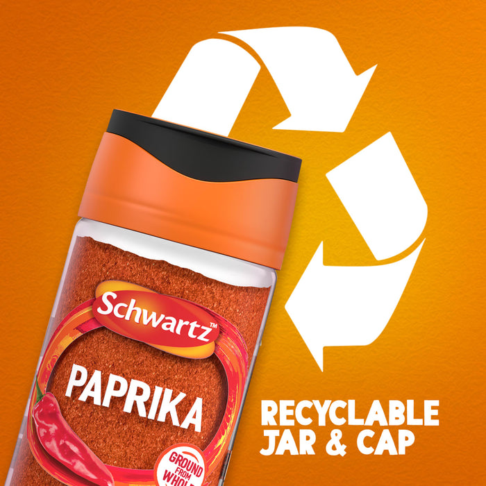 A jar of Schwartz Paprika 40G is shown against an orange background with a large recycling symbol to highlight its recyclable jar and cap.