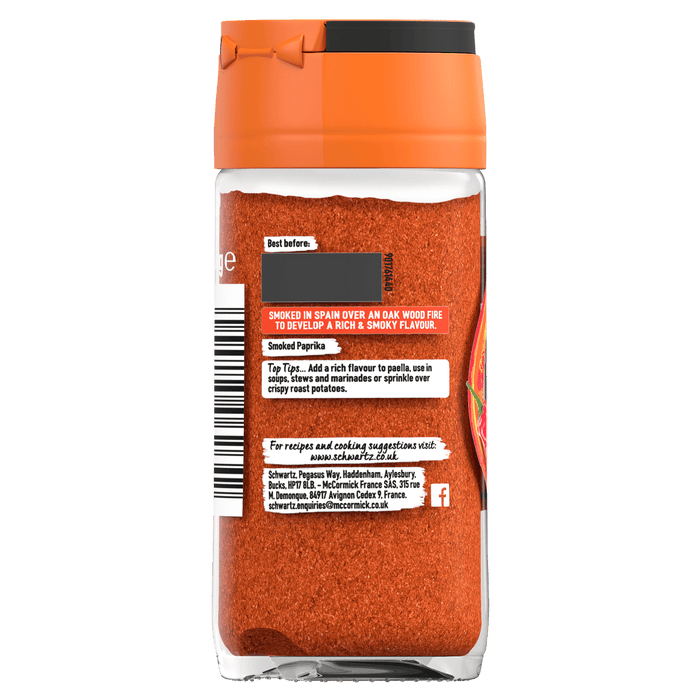 The back of a glass jar of Schwartz Smoked Paprika, showing cooking suggestions, the company address, and the website for recipes.