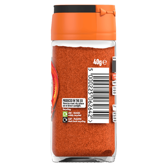 The back of a glass jar of Schwartz spice shows the barcode, recycling information, and storage instructions on the label.