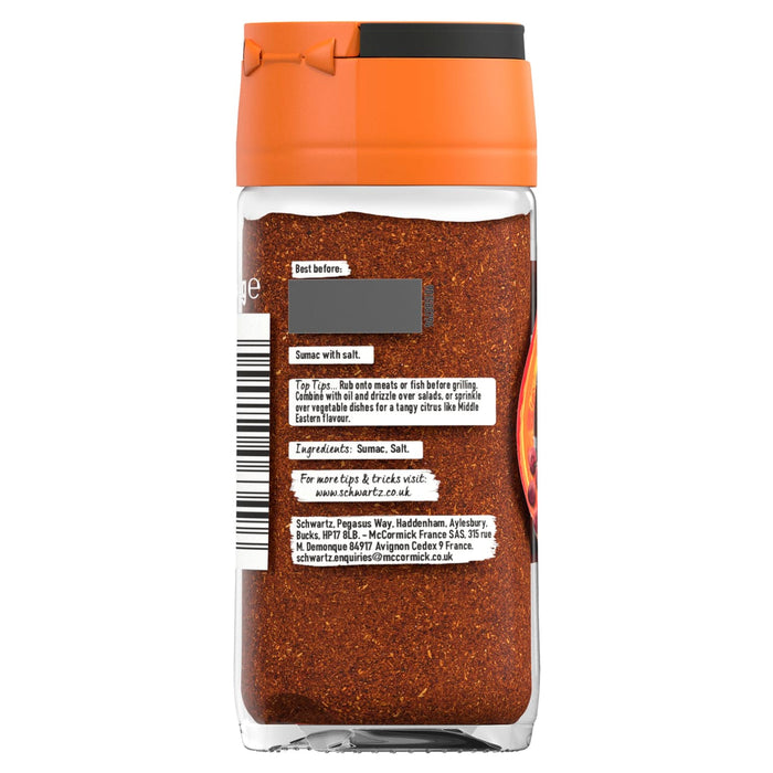 A back view of a glass jar of Schwartz Sumac Ground 44G showing the ingredient list and usage tips for a tangy citrus flavor.