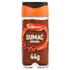 A clear glass jar of Schwartz Sumac Ground 44G filled with deep red spice and topped with a signature orange and black cap.