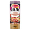 A container of Schwartz Af Turki Keb Seas, an air-fry seasoning, displays the granular spice through the clear bottom and features a serving suggestion of Turkish BBQ in pita bread on the label.