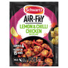 A black and pink sachet of Schwartz Sa Af Lemon Chilli Chicken recipe mix is shown next to a serving suggestion of cooked chicken and peppers.