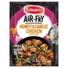 A package of Sa Af Honey Garlic Chicken from Schwartz shows a serving suggestion of the finished dish in a black bowl.