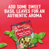 A promotional image for the Schwartz brand shows how adding fresh basil leaves can enhance the authentic aroma of a meal made with a packet of Sa Rt Green Curry X12.