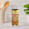 A bottle of Schwartz Jr Thai Sweet Chil Seas X6 stands on a marble countertop in a bright kitchen setting.